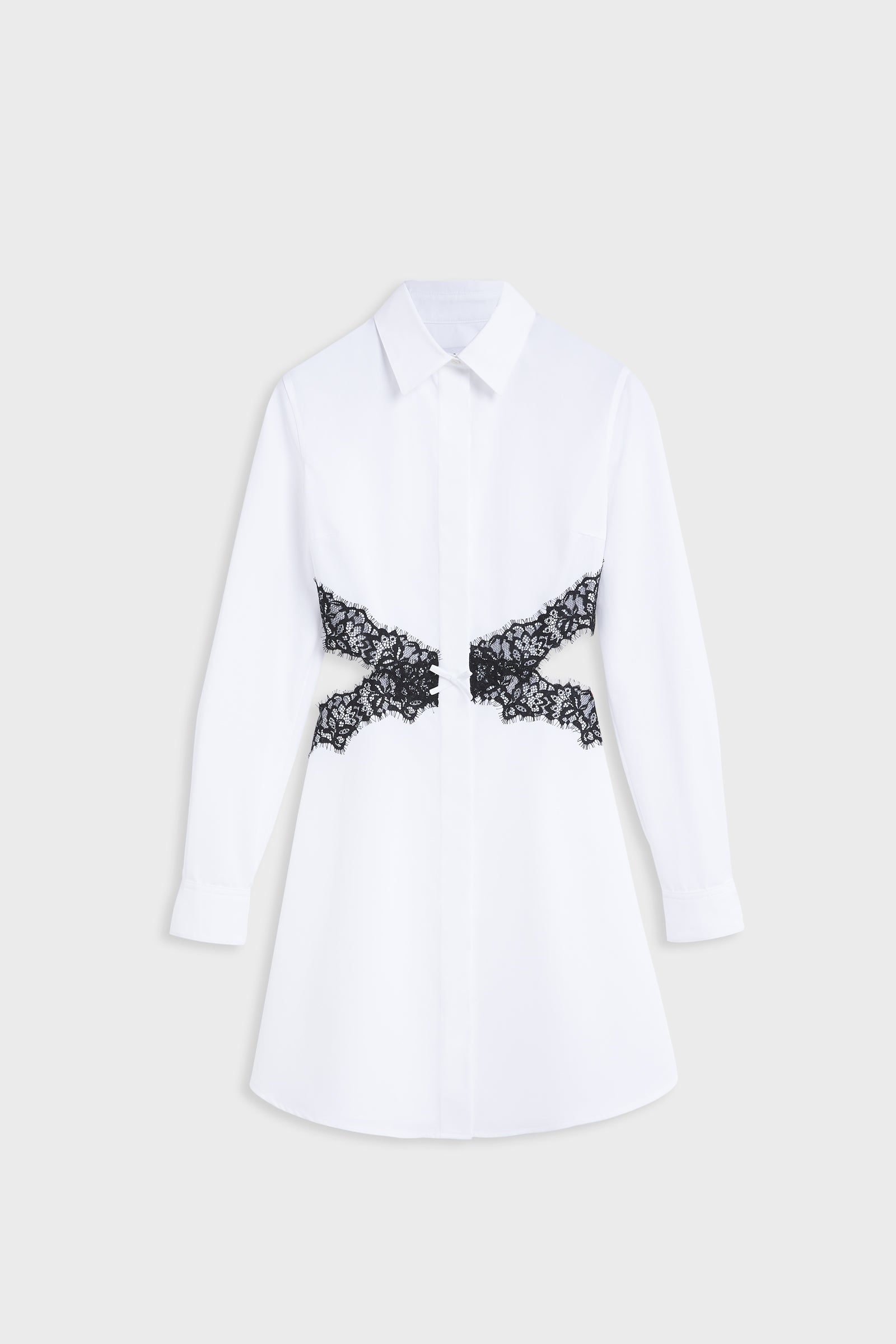 White poplin dress with black lace crossover and cut out.
