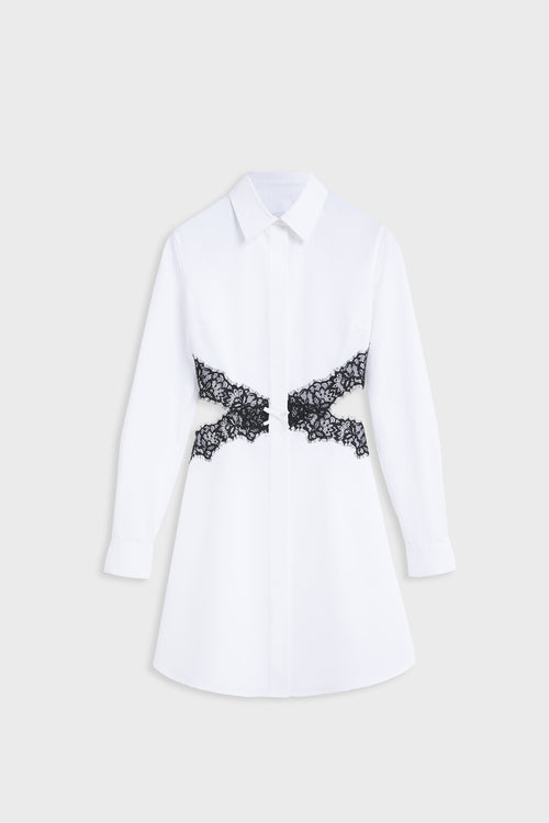 White poplin dress with black lace crossover and cut out.