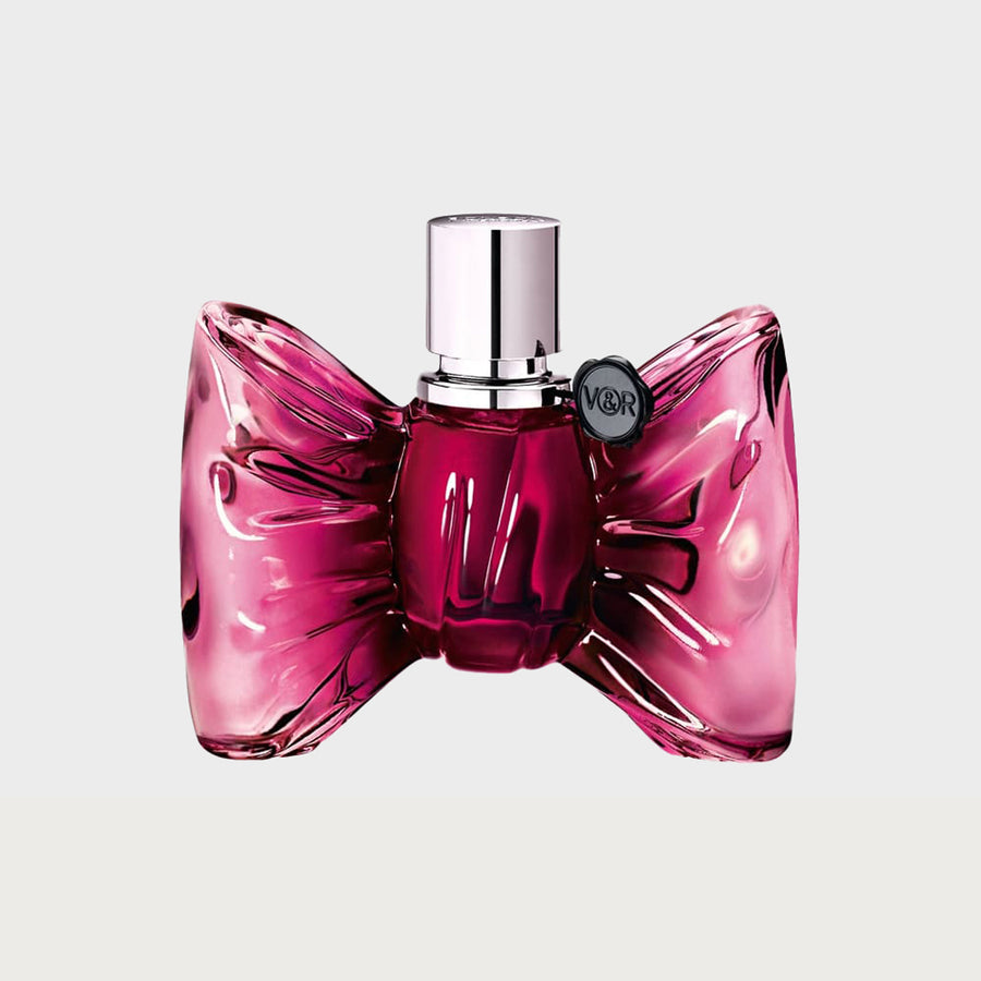 Viktor & Rolf pink BONBON perfume on a white background.