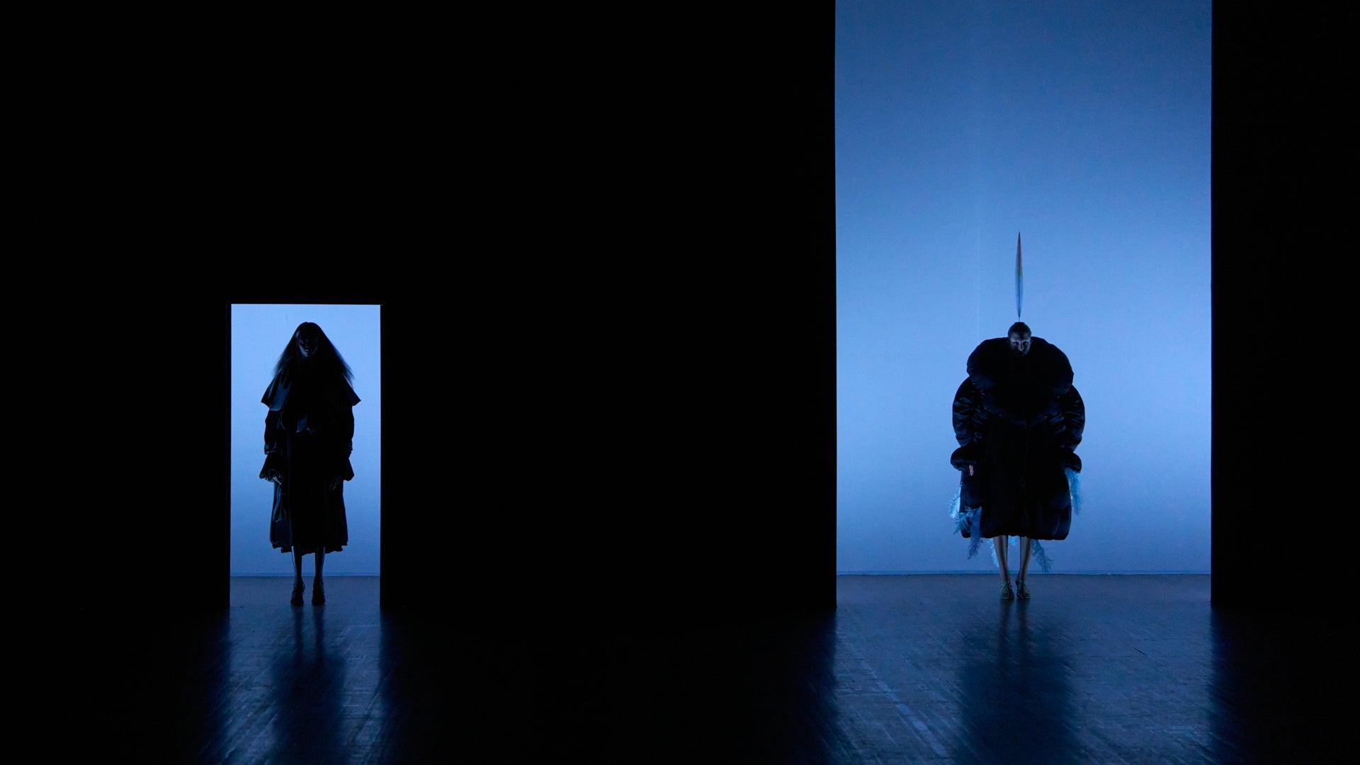 Viktor&Rolf Haute Couture Angry Birds show Autumn/Winter 2025, displaying models with feather featured gowns.