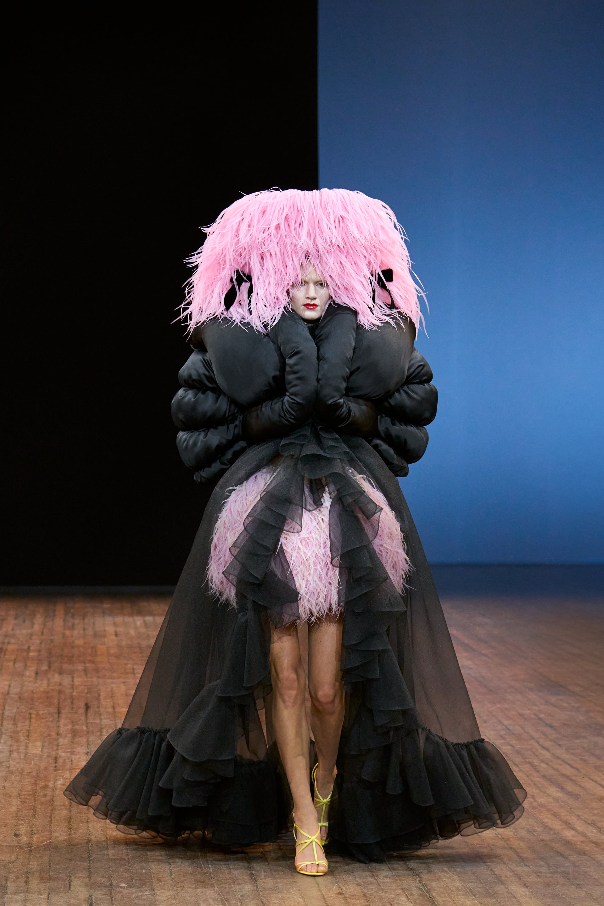 Viktor&Rolf Haute Couture Angry Birds show Autumn/Winter 2025, displaying one of the looks. The model is wearing a feather featured gown.