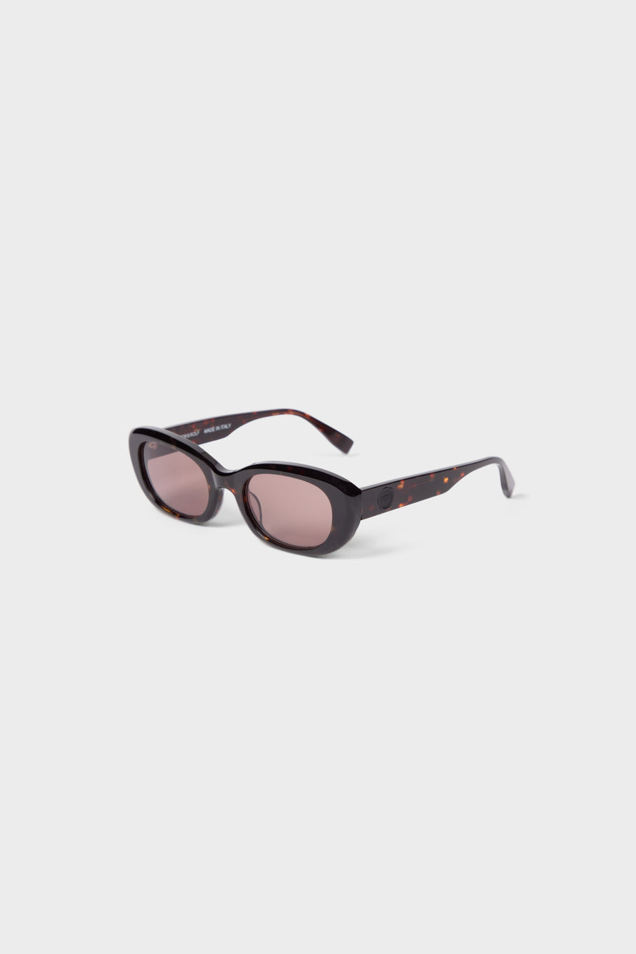 Tortoise oval sunglasses on a white background.