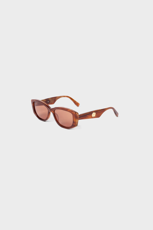 Light tortoise sunglasses on a white background.