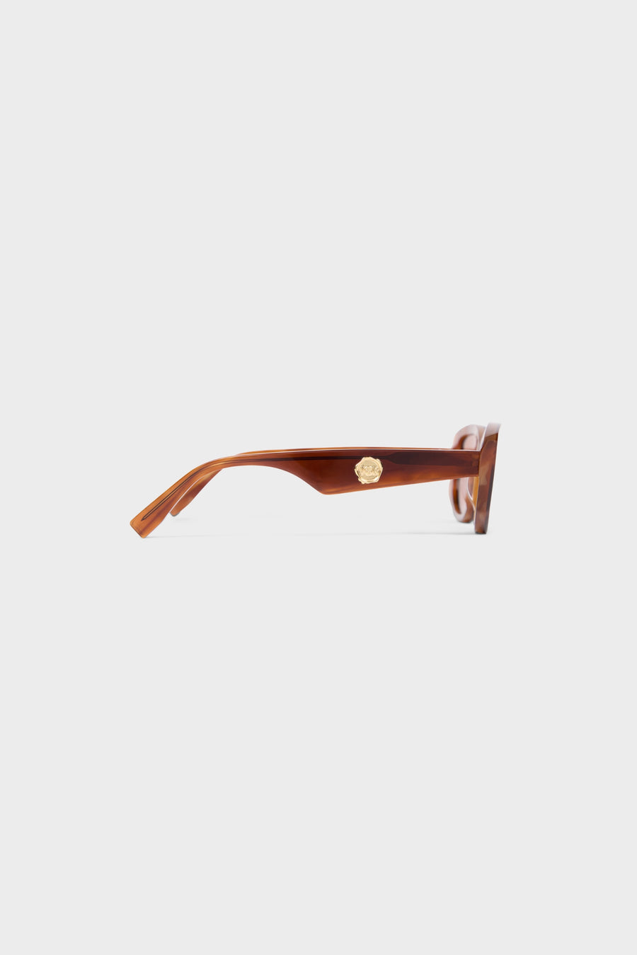 Light tortoise sunglasses on a white background.