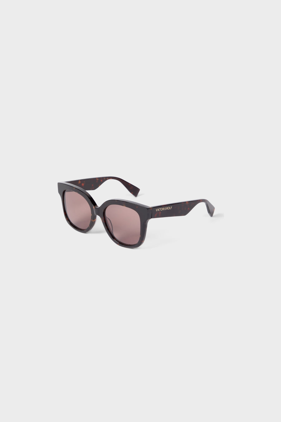 Bold tortoiseshell sunglasses featuring oversized round frames and tinted lenses, ideal for a chic, modern look.