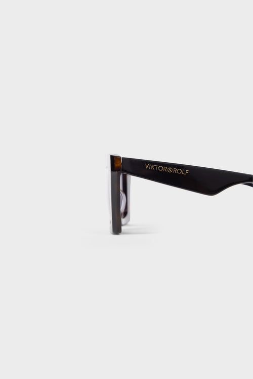 Black square sunglasses on a white background.