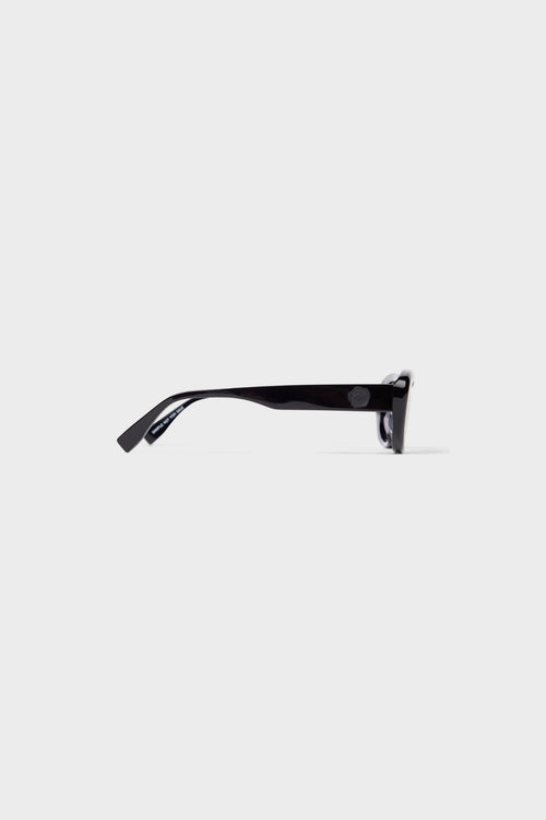 Stylish sunglasses with glossy black acetate frame.