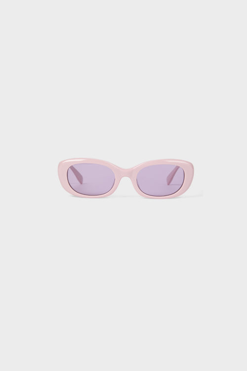 Light pink sunglasses on a white background.