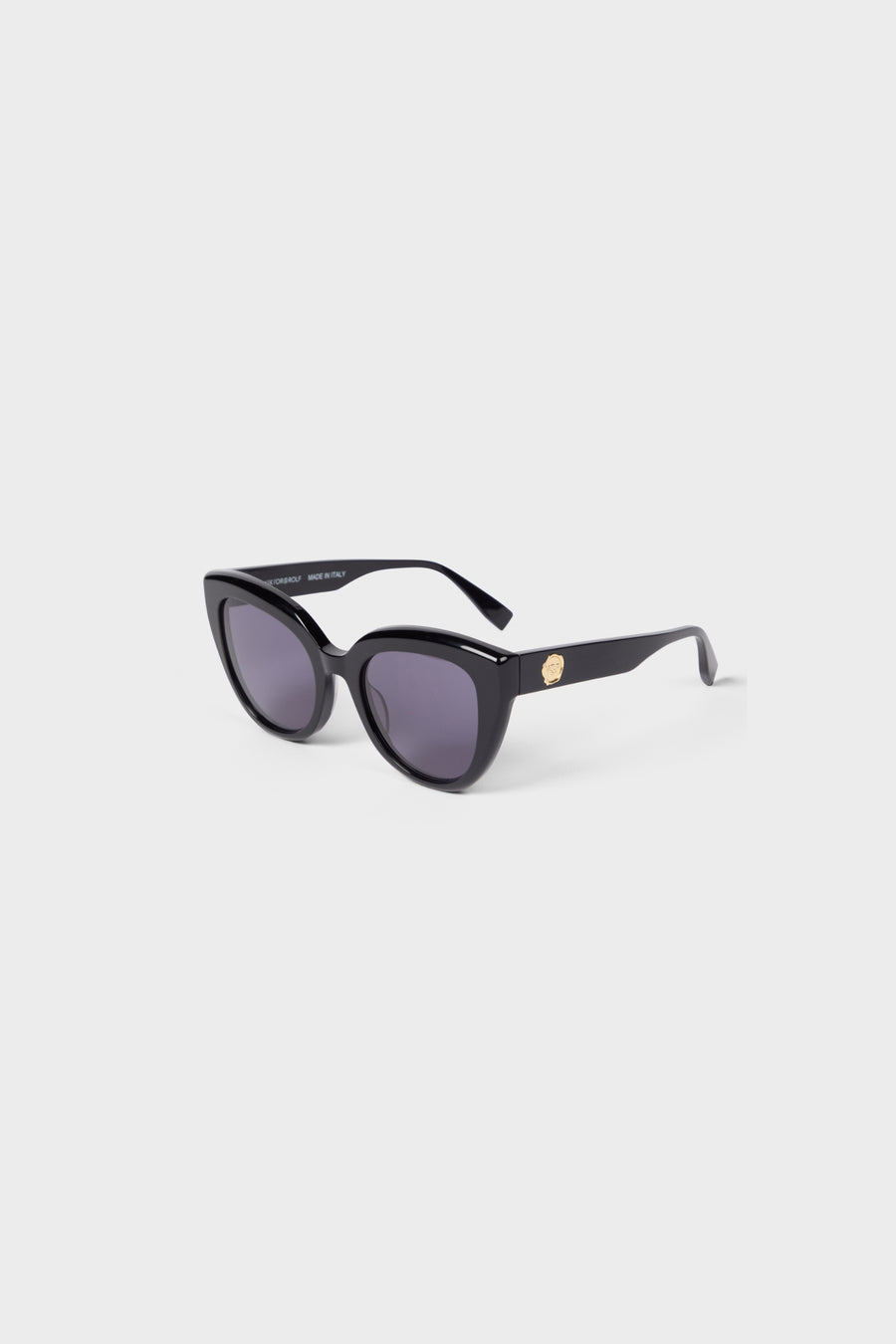 Black cat-eye sunglasses on a white background.