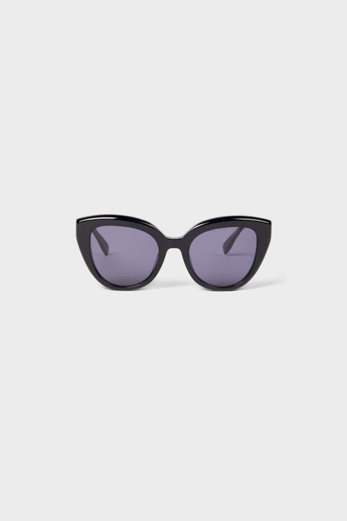 Black cat-eye sunglasses on a white background.