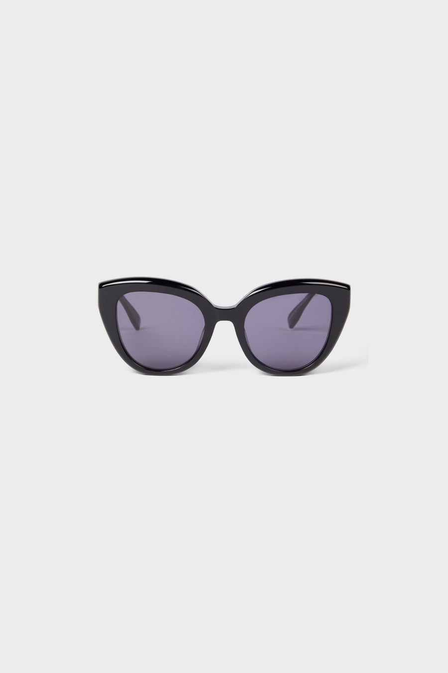 Black cat-eye sunglasses on a white background.