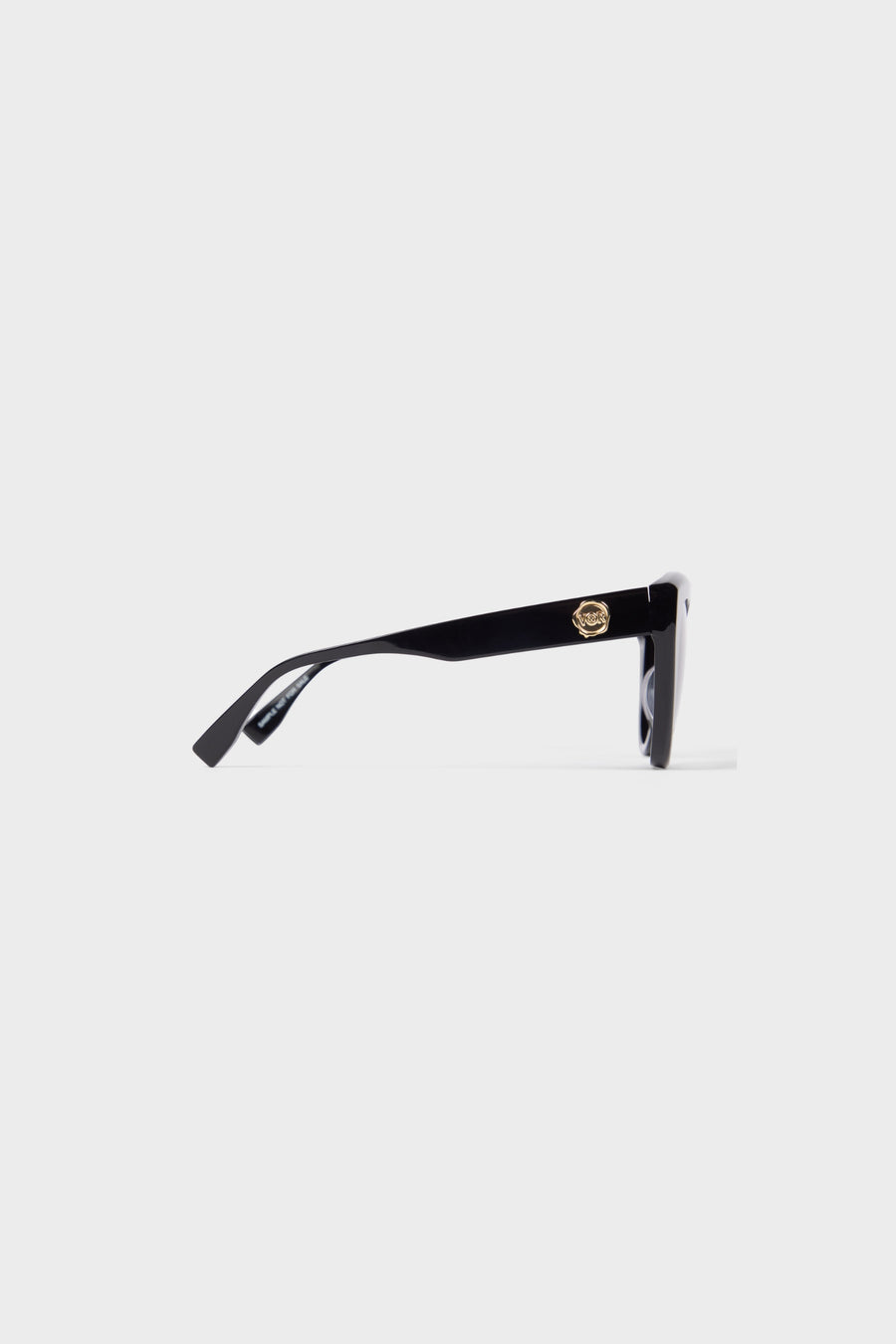 Black cat-eye sunglasses on a white background.