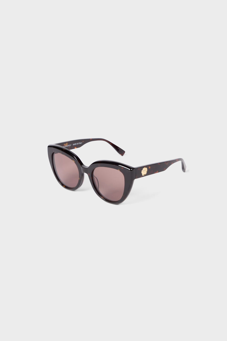 Tortoise cat-eye sunglasses on a white background.