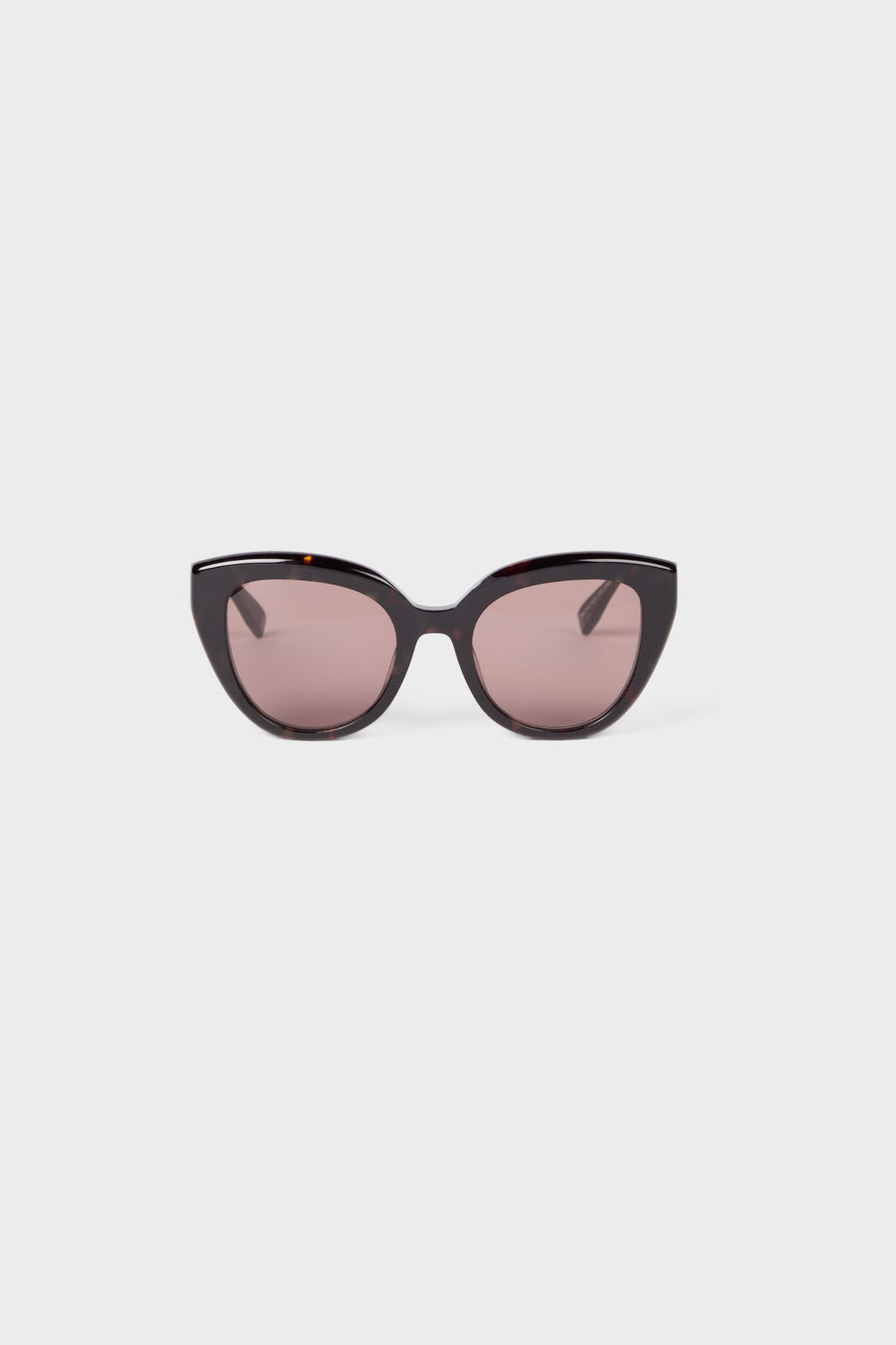 Tortoise cat-eye sunglasses on a white background.