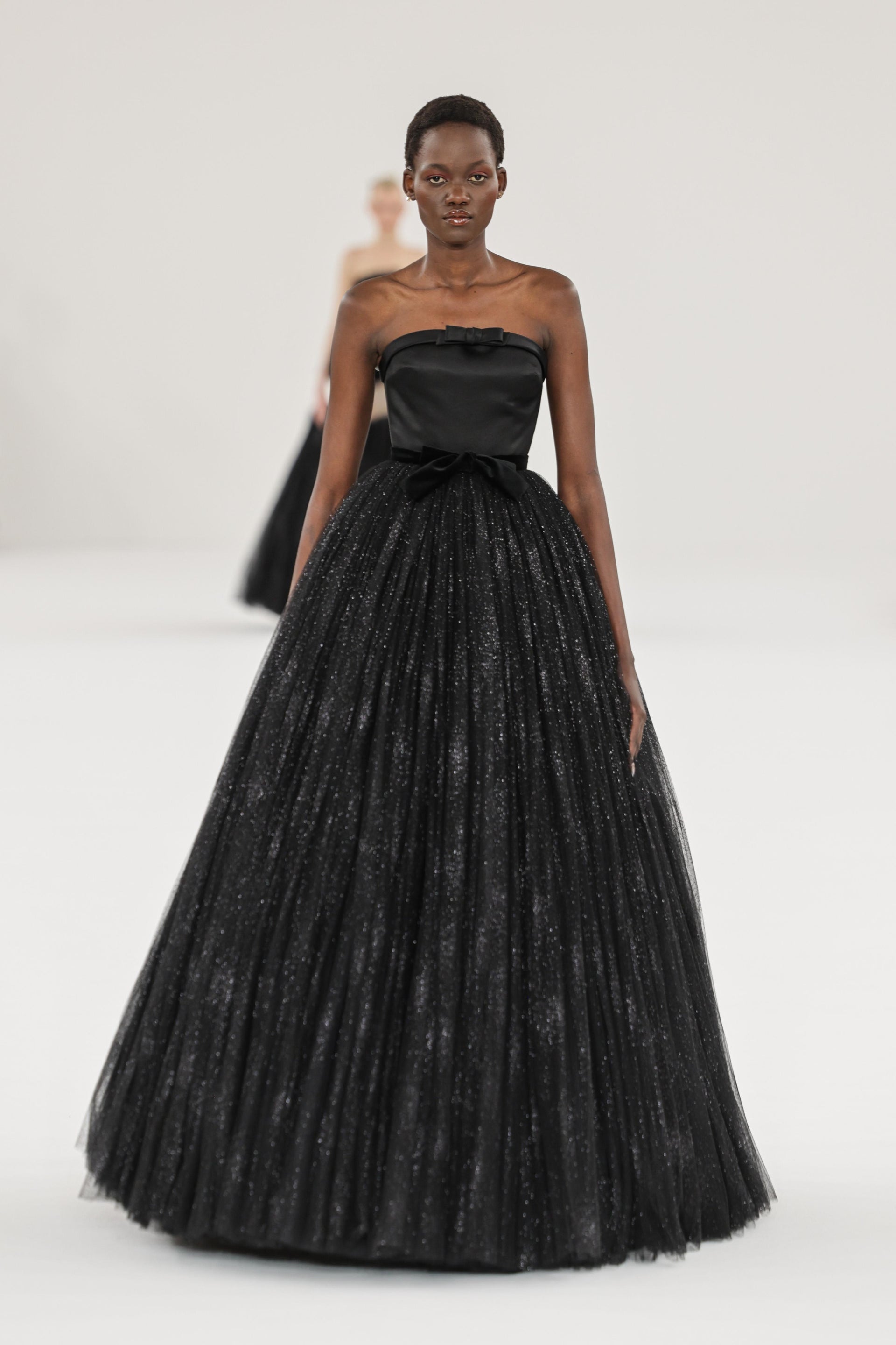 viktor and rolf cut out dresses Viktor & Rolf creates rotated ballgowns for Paris Couture Week