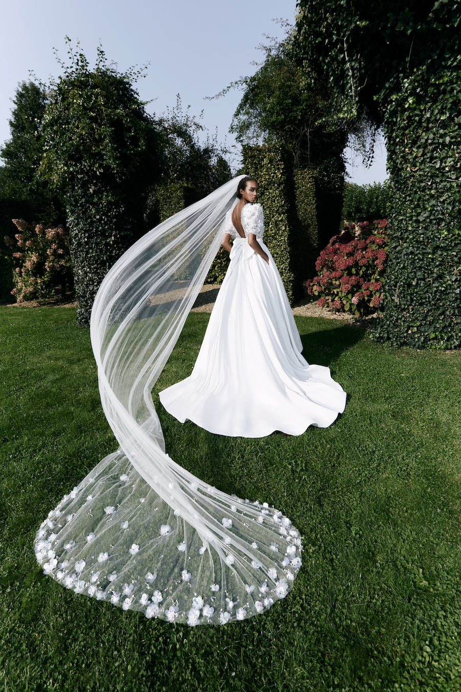 Viktor & Rolf Mariage Bridalwear Collection, Pailette floral gardens a-line gown with elegant flowing veil.