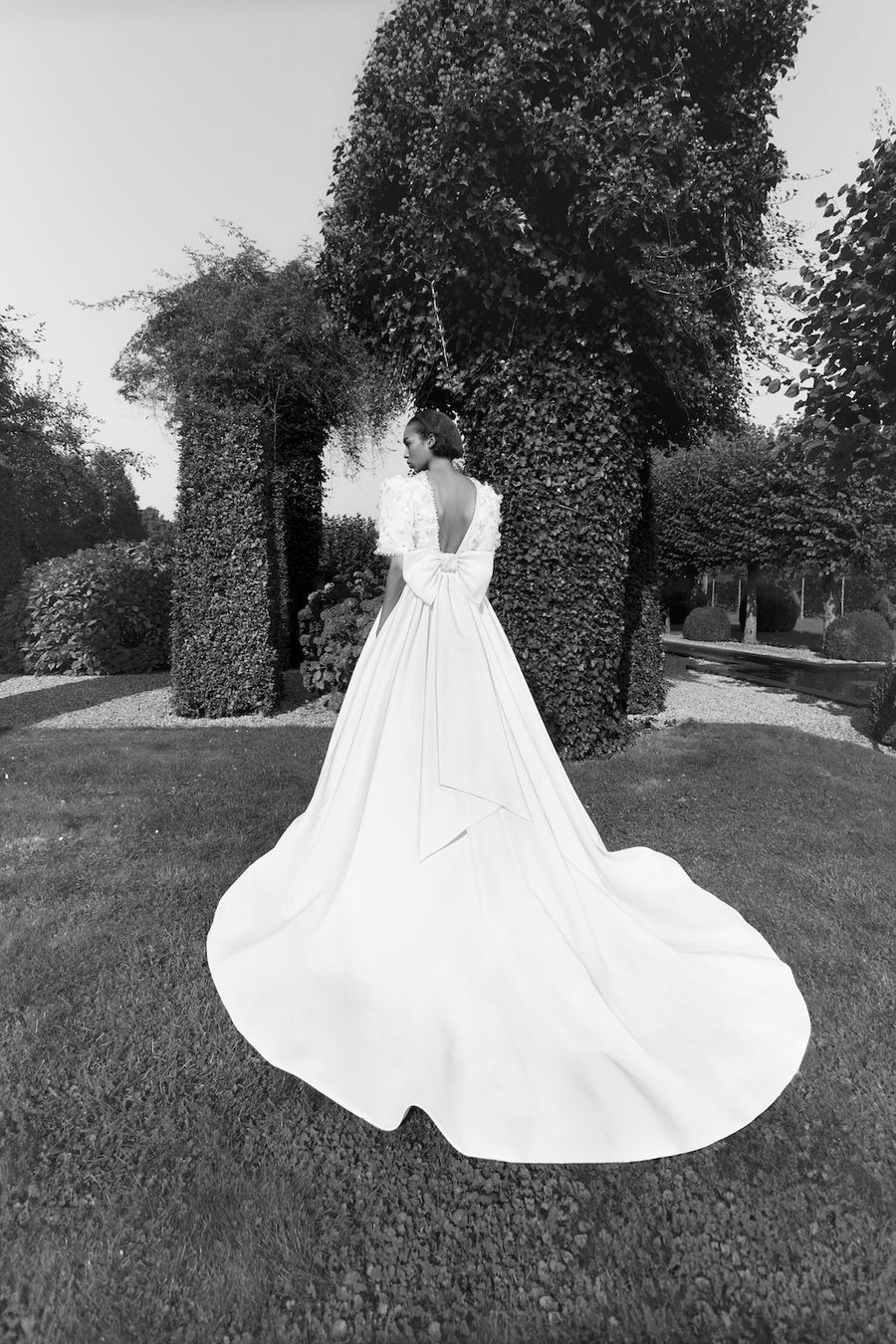 Viktor & Rolf Mariage Bridalwear Collection, Pailette floral gardens a-line gown, elegant design with floral detailing.