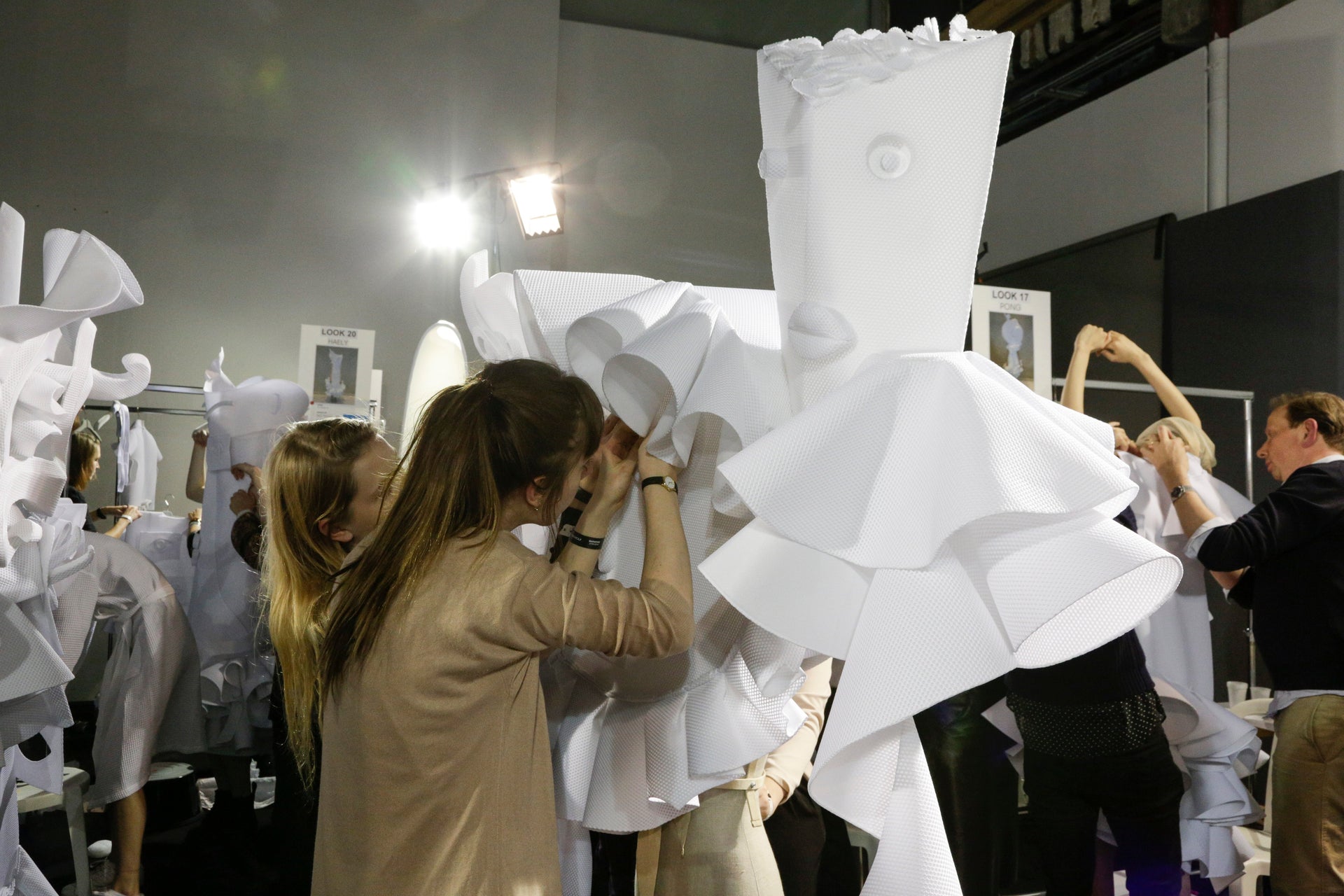 finishing white haute couture dress