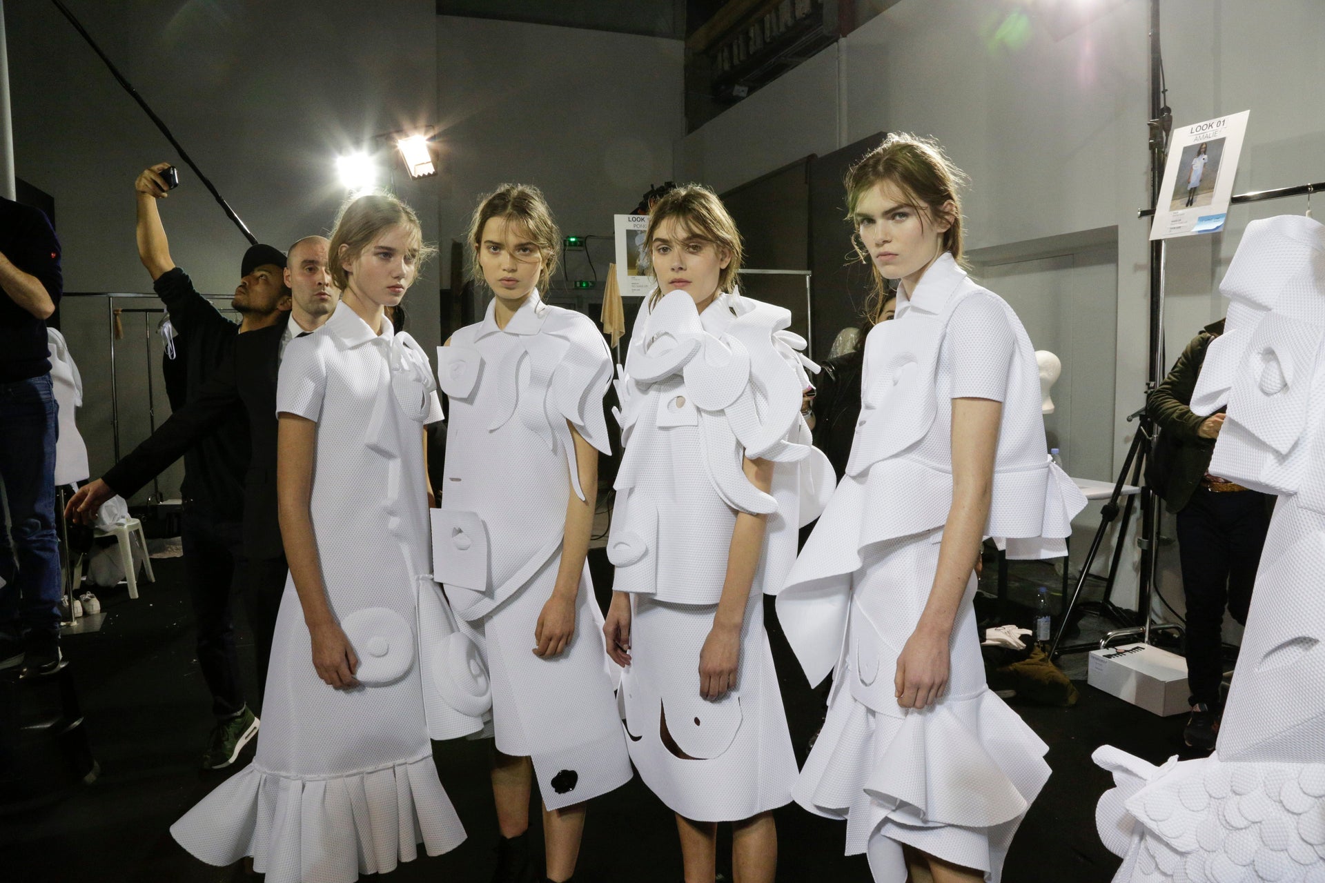 models in white haute couture dresses