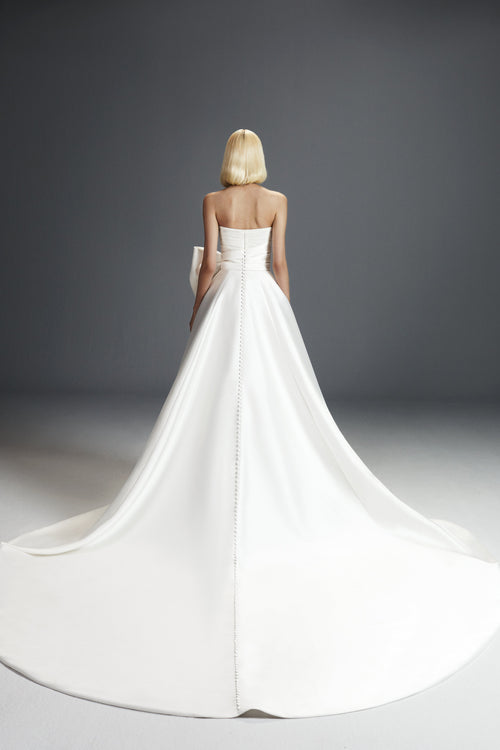 Viktor & Rolf Mariage Bridalwear Collection, Strapless dreamy bow a-line gown with elegant design and couture craftsmanship.