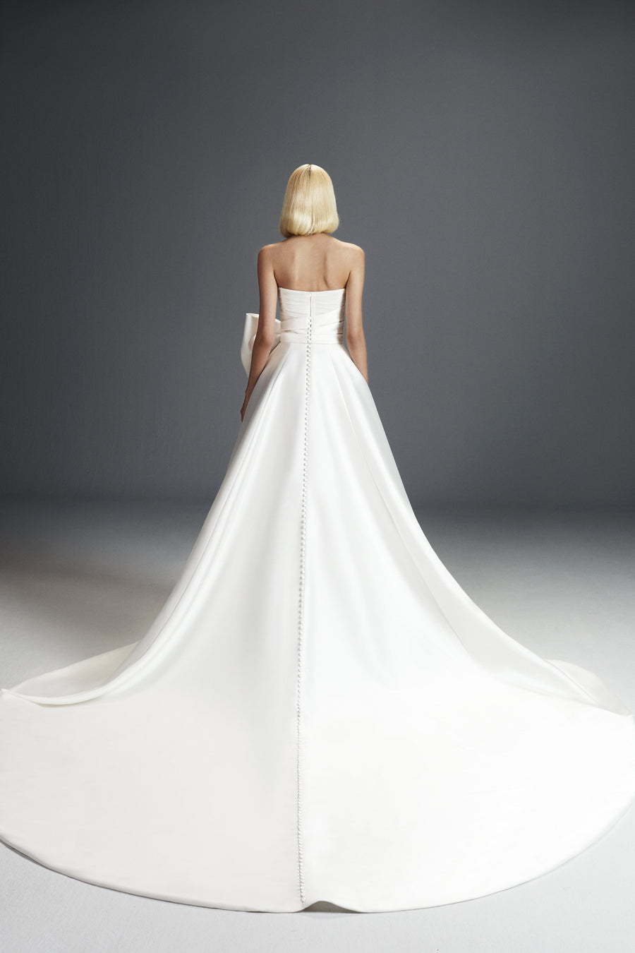 Viktor & Rolf Mariage Bridalwear Collection, Strapless dreamy bow a-line gown with elegant design and couture craftsmanship.