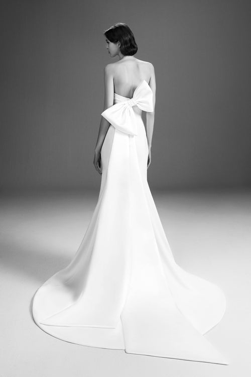Viktor & Rolf Mariage Bridalwear Collection sculpted bow gown, strapless design with elegant, flowing silhouette.