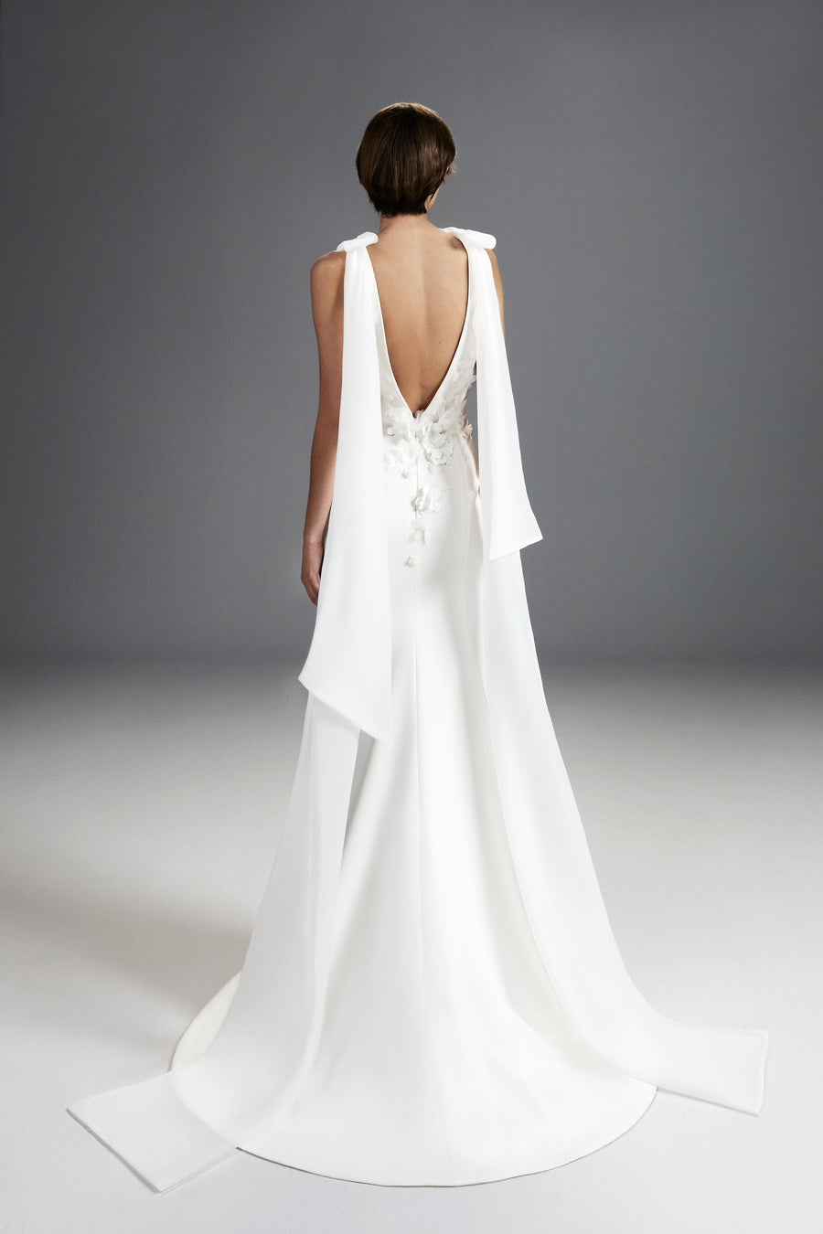 Viktor & Rolf Mariage Bridalwear Collection. Fairytale flowers gown, elegant design with floral accents and flowing silhouette.