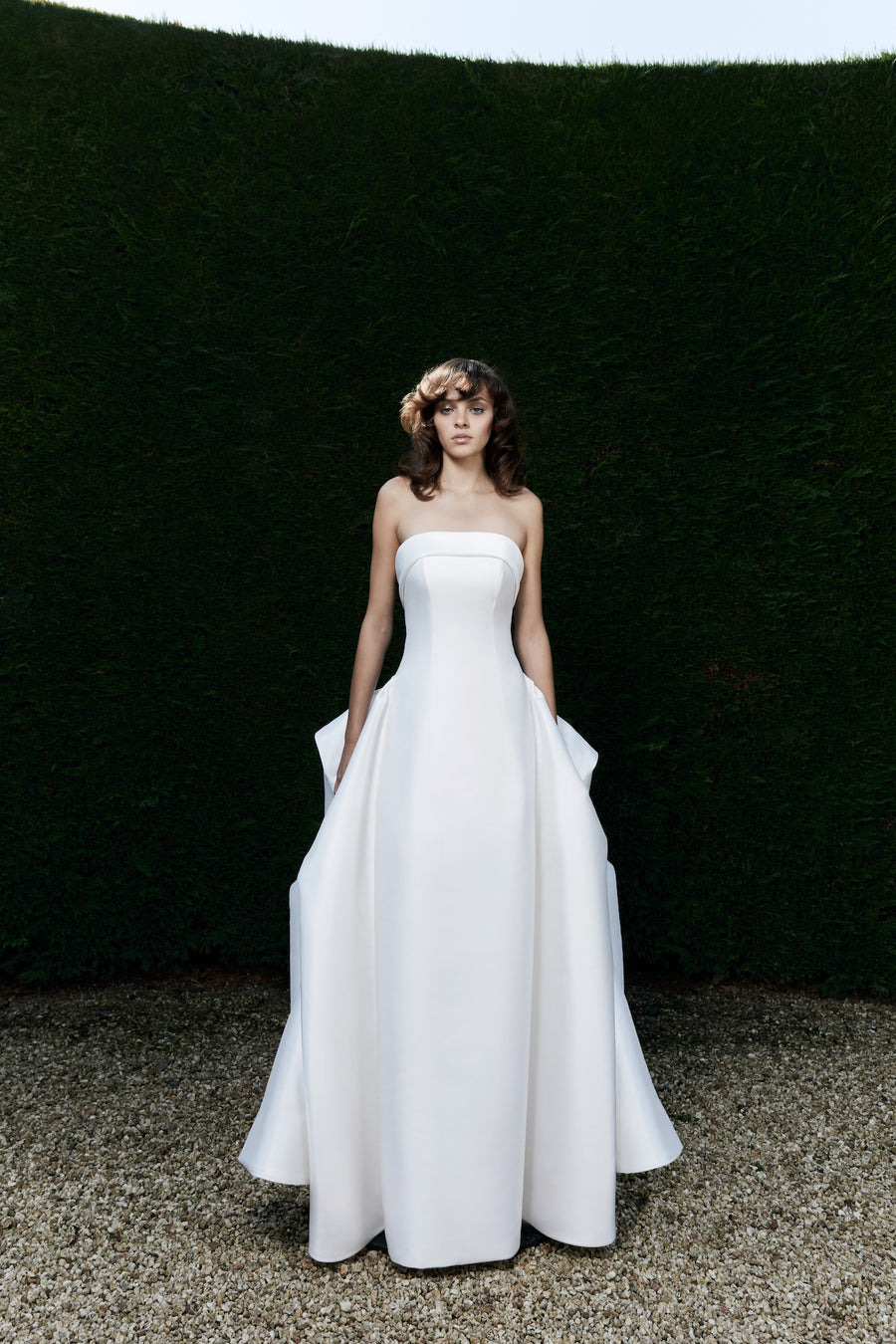 Viktor & Rolf Mariage Bridalwear Collection, Autumn Winter 25, strapless gown with minimalist elegance and refined tailoring.