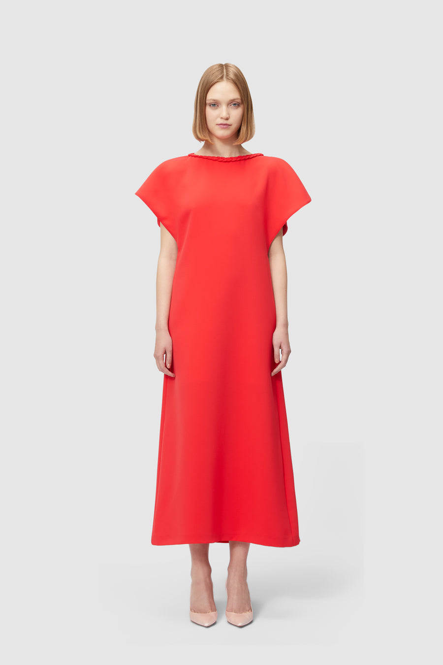 A-line red dress with cap sleeves crafted from smooth fabric, featuring a minimalistic silhouette ideal for formal occasions.