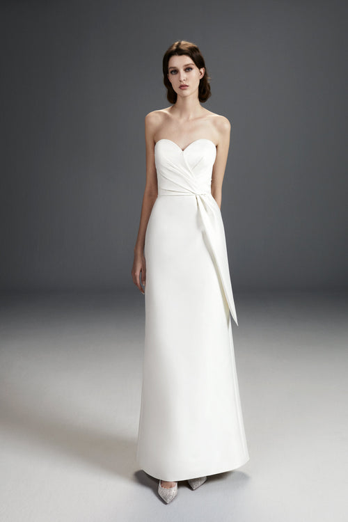 Viktor & Rolf Mariage Bridalwear Collection, strapless dreamy bow gown, chic and elegant design with couture detailing.