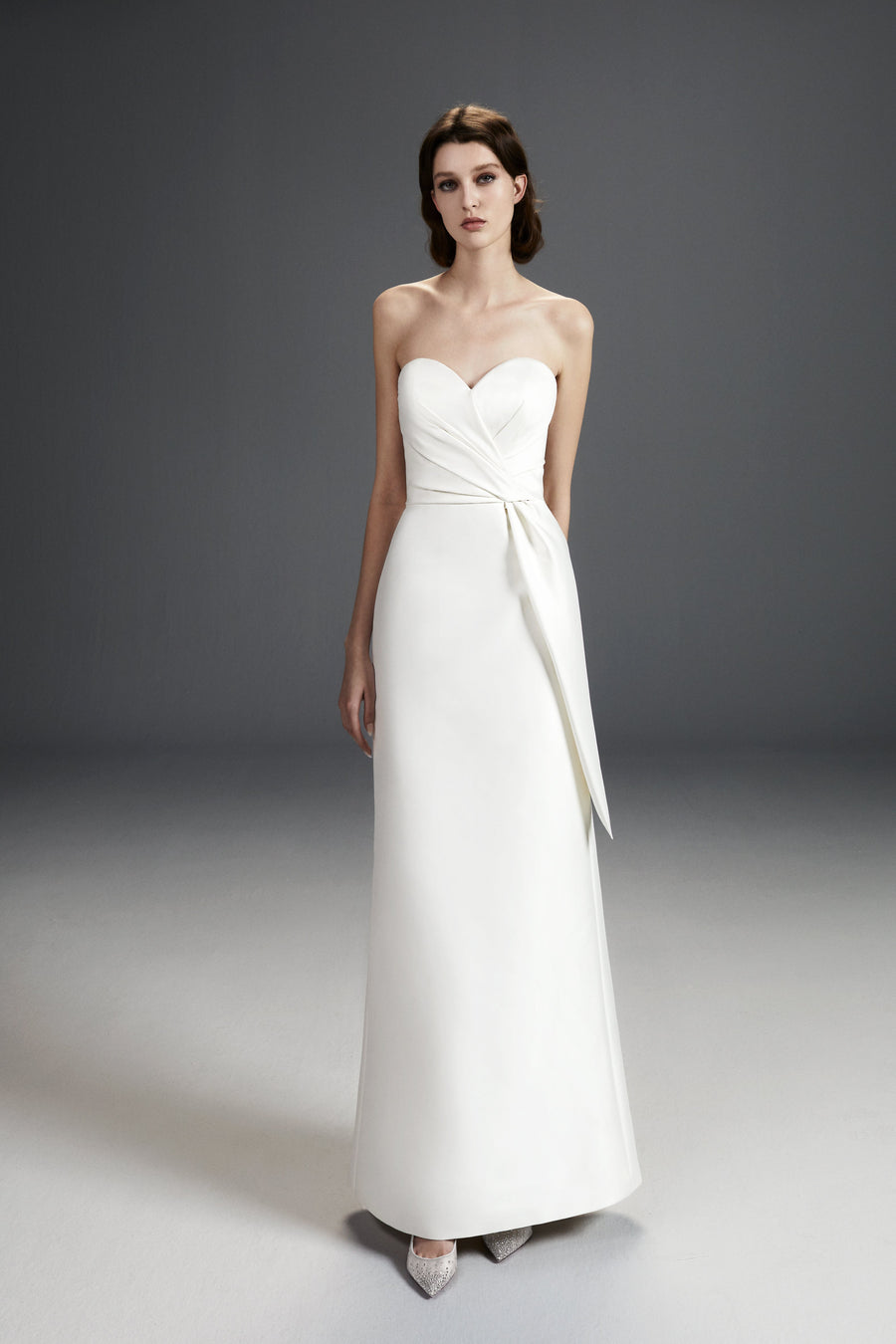 Viktor & Rolf Mariage Bridalwear Collection, strapless dreamy bow gown, chic and elegant design with couture detailing.