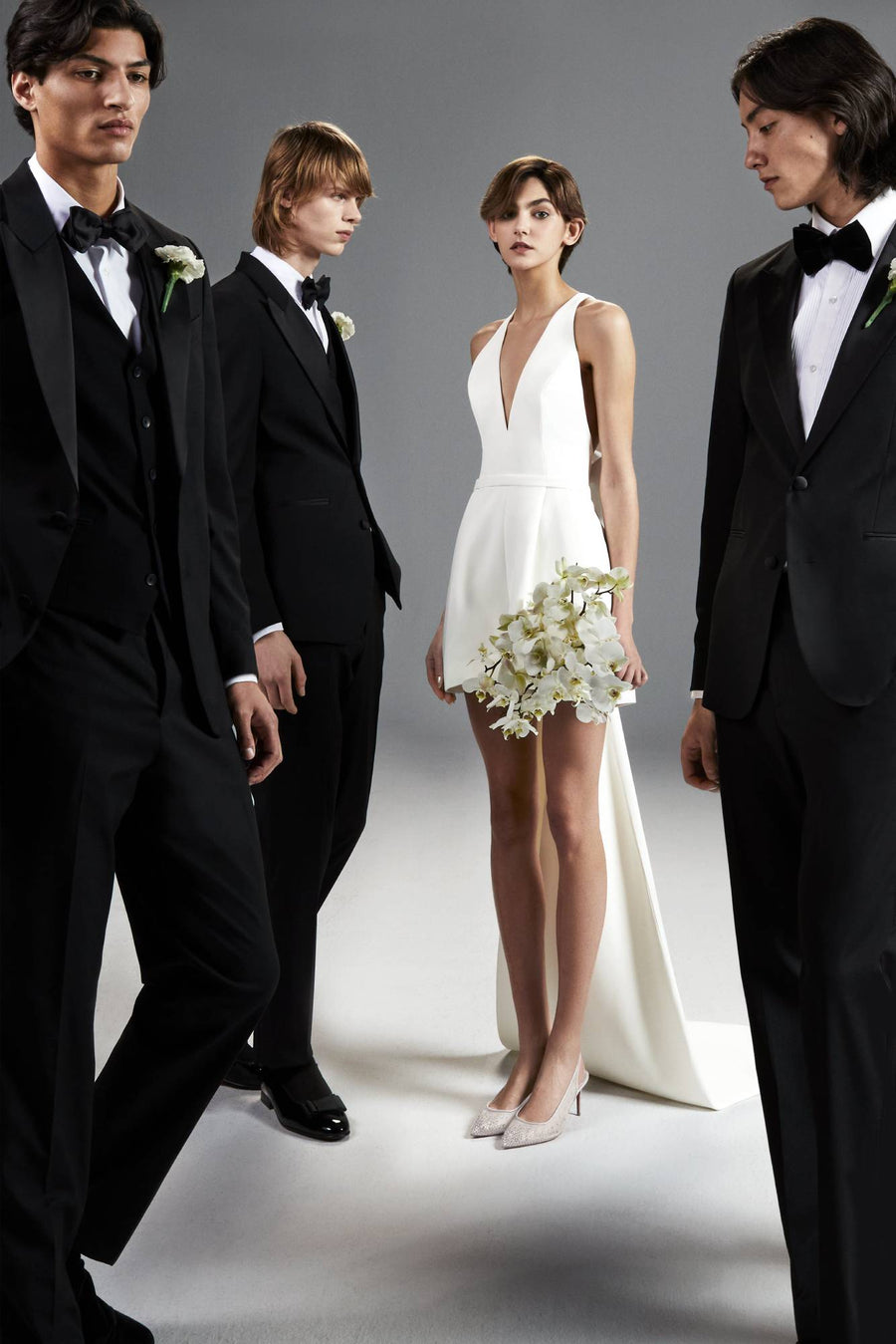 Viktor & Rolf Mariage Bridalwear Collection: Dreamy bow romper, chic design with elegant tailoring and modern elegance.