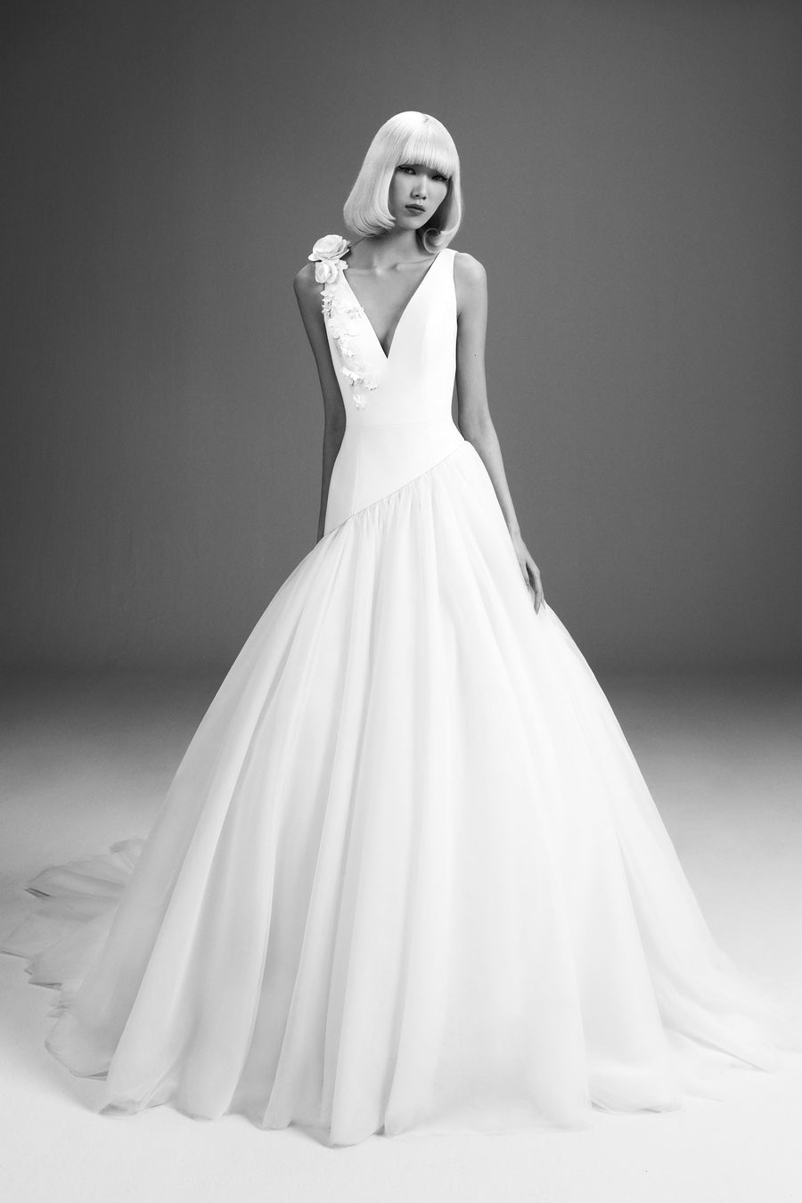 Viktor & Rolf Mariage Bridalwear Collection Flower bouquet tulle gown, elegant A-line design with floral shoulder detail.