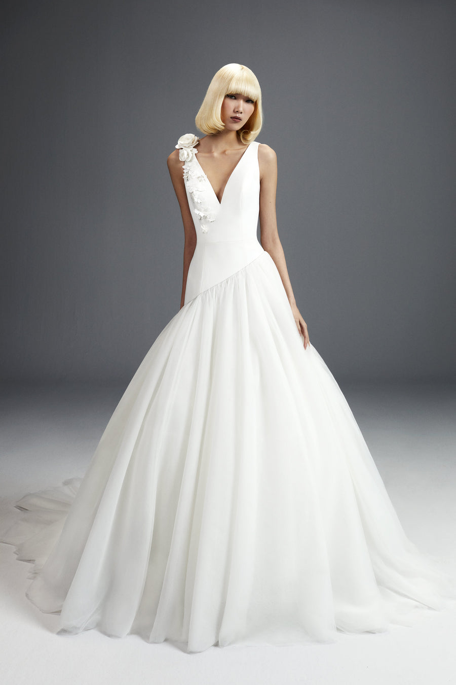 Viktor & Rolf Mariage Bridalwear Collection, Flower bouquet tulle gown with floral detail on shoulder, elegant design.