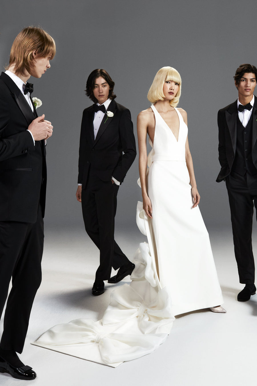 Viktor & Rolf Mariage Bridalwear Collection, Dreamy Bow Mermaid gown, elegant design, couture craftsmanship.