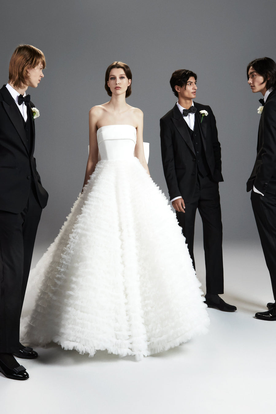 Viktor & Rolf Mariage Bridalwear Collection, Tulle Ruffle Gown showcasing elegance with modern couture details.