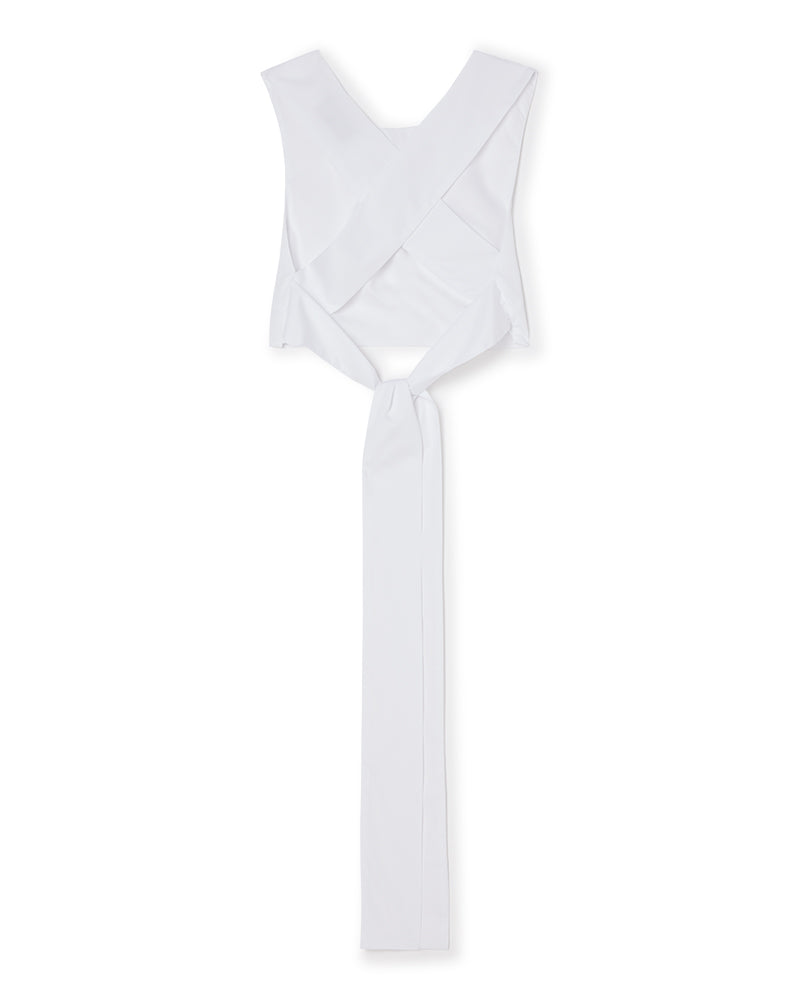 White cross-back apron with long ties, featuring a minimalist design crafted from smooth fabric for a sleek, modern look.