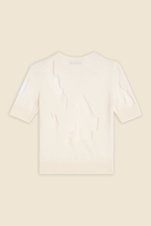Cream crew neck short-sleeve sweater with distressed detailing on a light beige background, emphasizing texture and style.