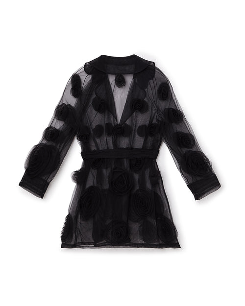 Black sheer organza dress adorned with large, textured rosette patterns, featuring a belted waist and three-quarter sleeves.