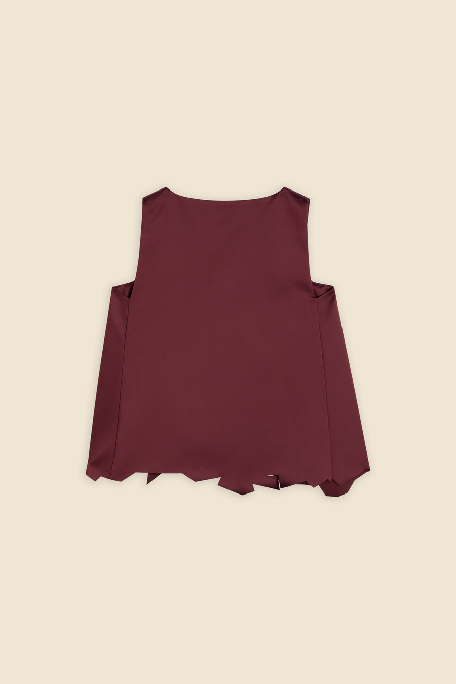 Sleeveless top in deep maroon with clean lines and an asymmetrical hem design set against a neutral background.
