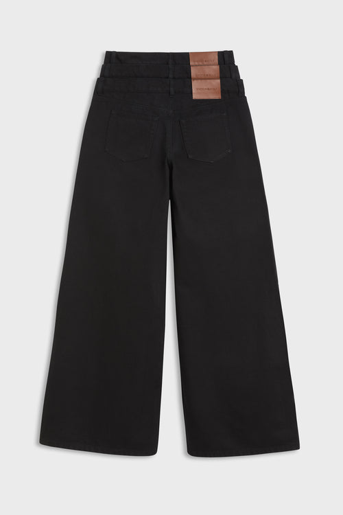MULTI-LAYERED DENIM TROUSERS