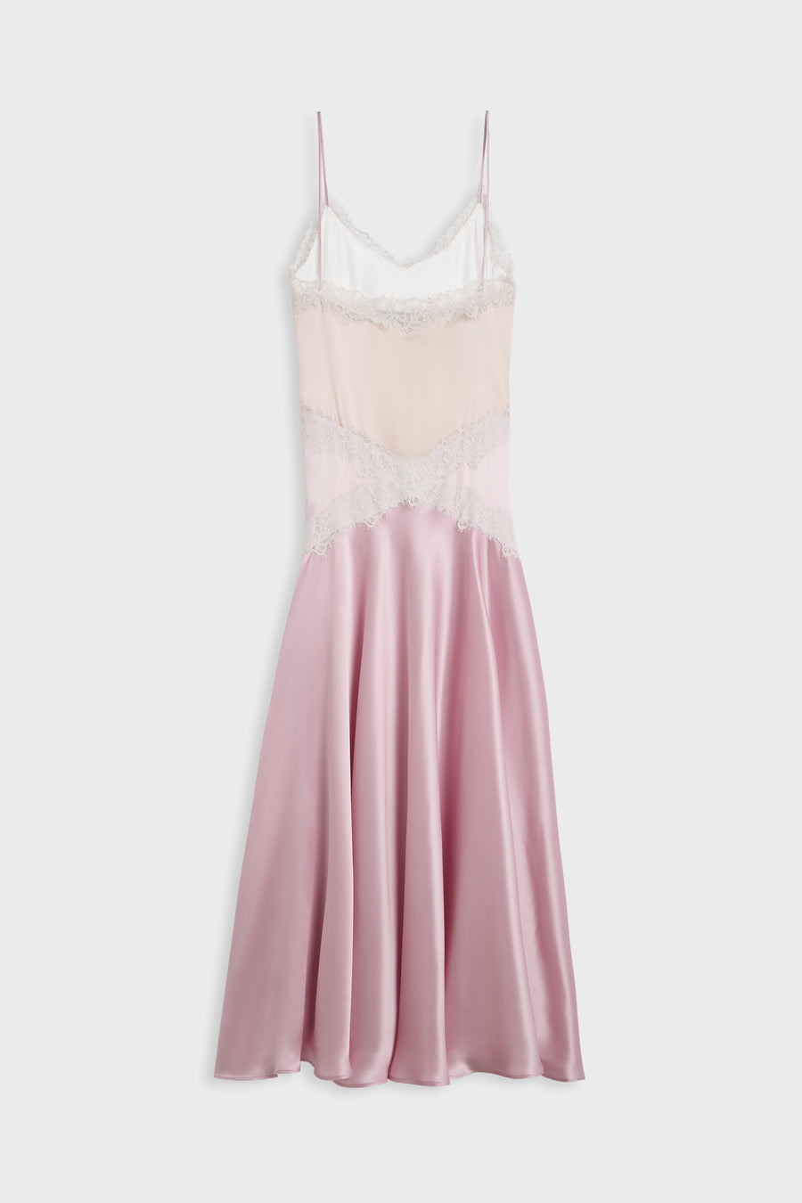 A pink satin slip dress with a light pink lace bodice and white lace trim, shown against a light gray background.