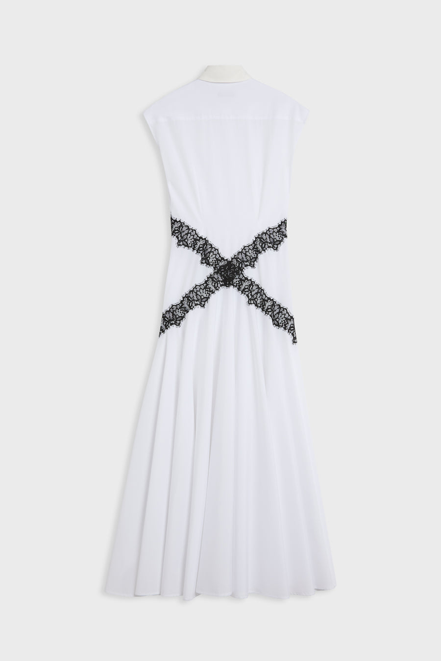 White sleeveless midi dress shown from the back, featuring a black lace criss-cross detail at the waist, displayed on a mannequin against a light gray background.