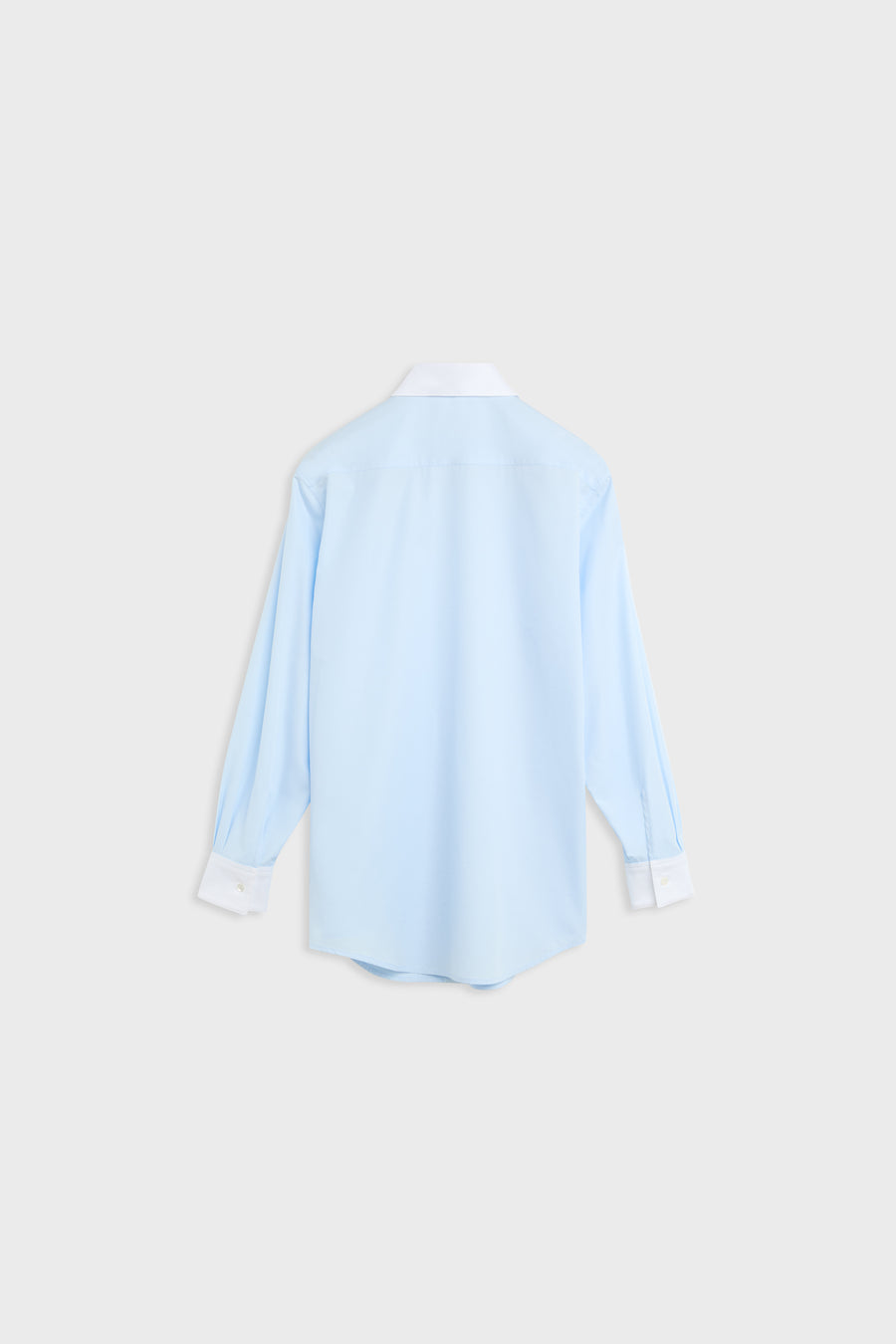A light blue long-sleeve button-up shirt shown from the back, featuring a white collar and white cuffs, displayed against a light gray background.