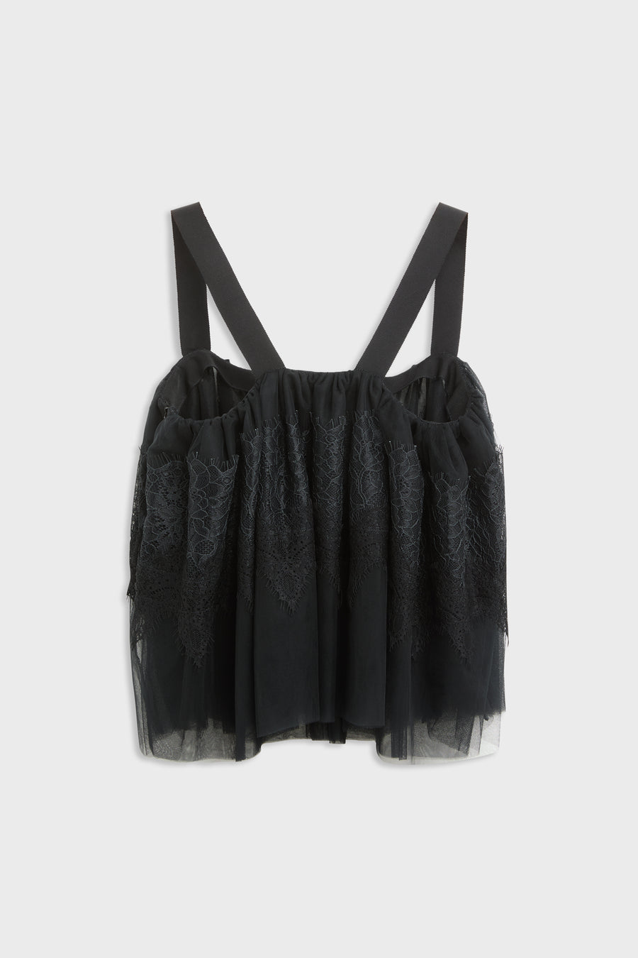 Black top with tulle and lace desing with straps shot from the back.