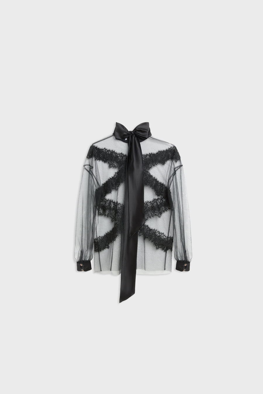 A sheer black long-sleeve blouse with black lace appliques and a matching black necktie bow, displayed on a neutral light gray background.