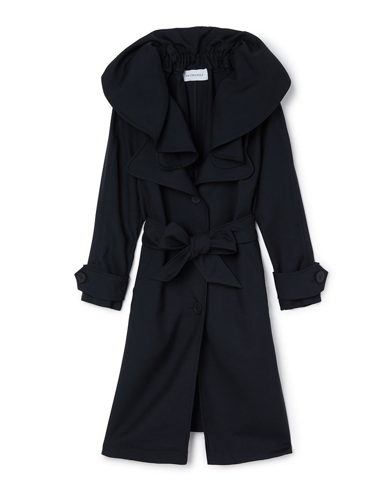Elegant black trench coat featuring oversized lapels and a wide belt, offering a sophisticated and modern silhouette.