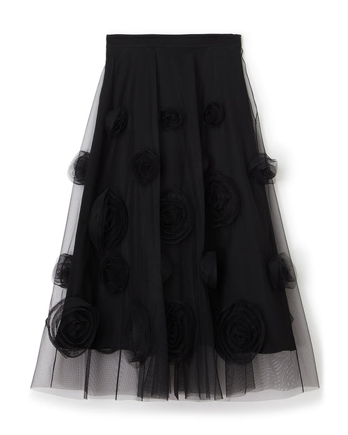 Black skirt with elegant tulle overlay, adorned with dimensional floral appliqués, creating a sophisticated textured look.