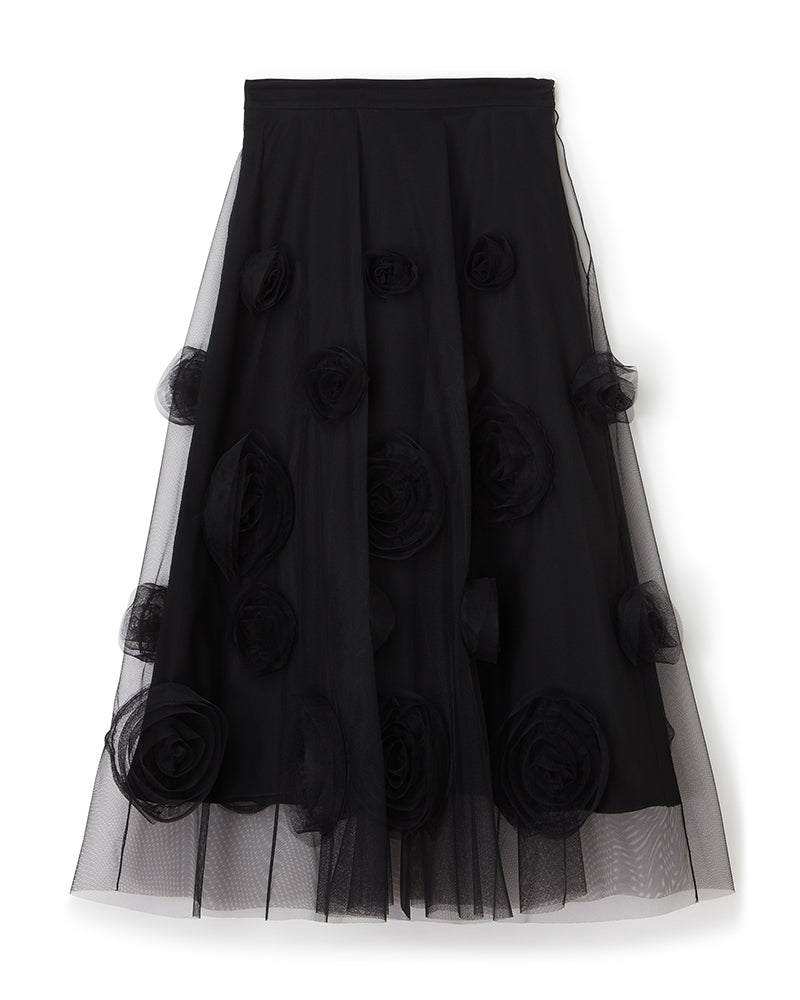 Black skirt with elegant tulle overlay, adorned with dimensional floral appliqués, creating a sophisticated textured look.