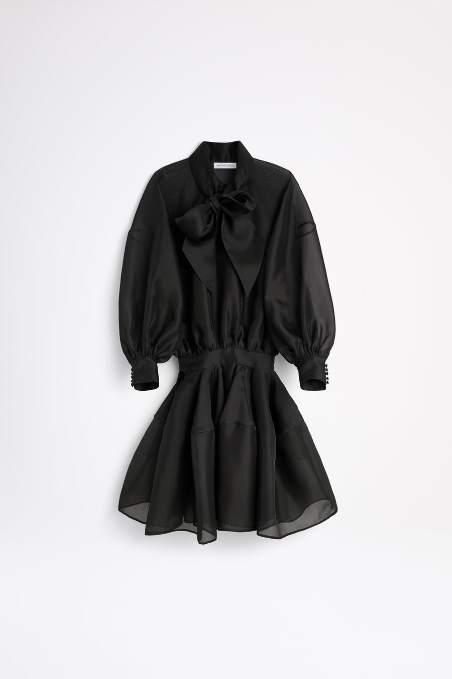 Black dress with a bow detail on a white background